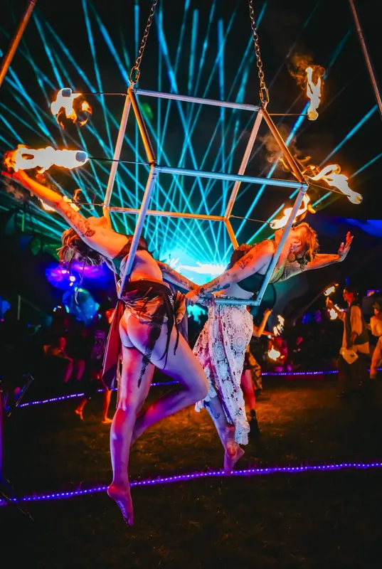 Fire performer inside the lit aerial frame at Sound Haven 2026