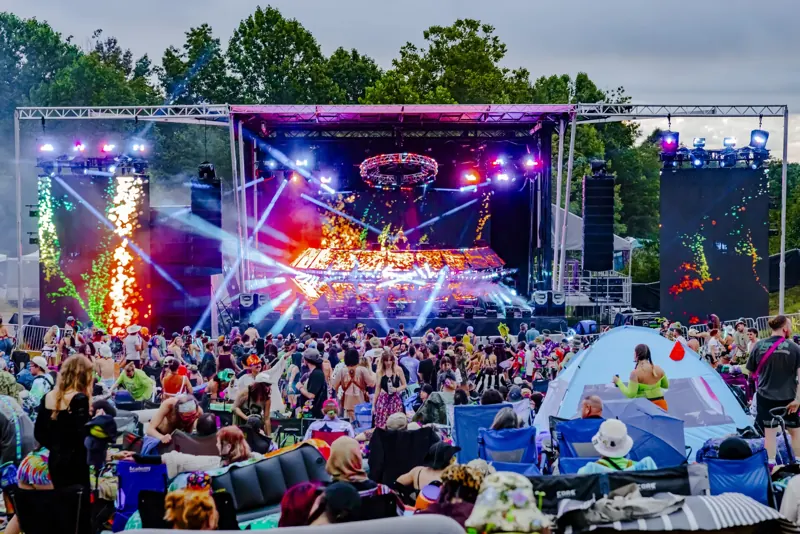 Pyro over the mainstage crowd in daylight at Sound Haven 2026