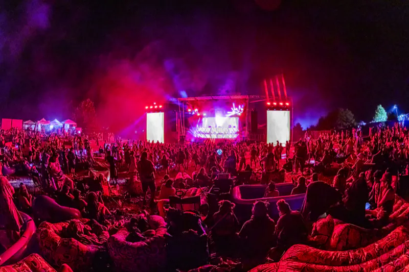 Crowd under red stage lights at the Sound Haven 2026 mainstage after dark